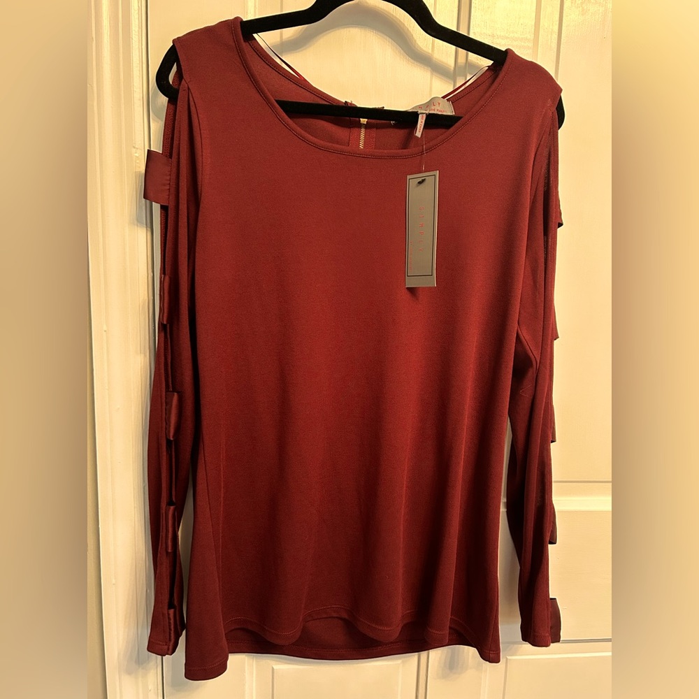 NWT Cold shoulder/arm too.  Great for a night out!